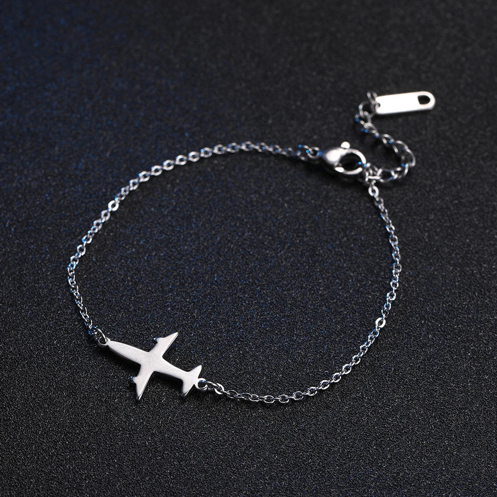 Pulsera con colgante de avión  joyería de mano de acero inoxidable.