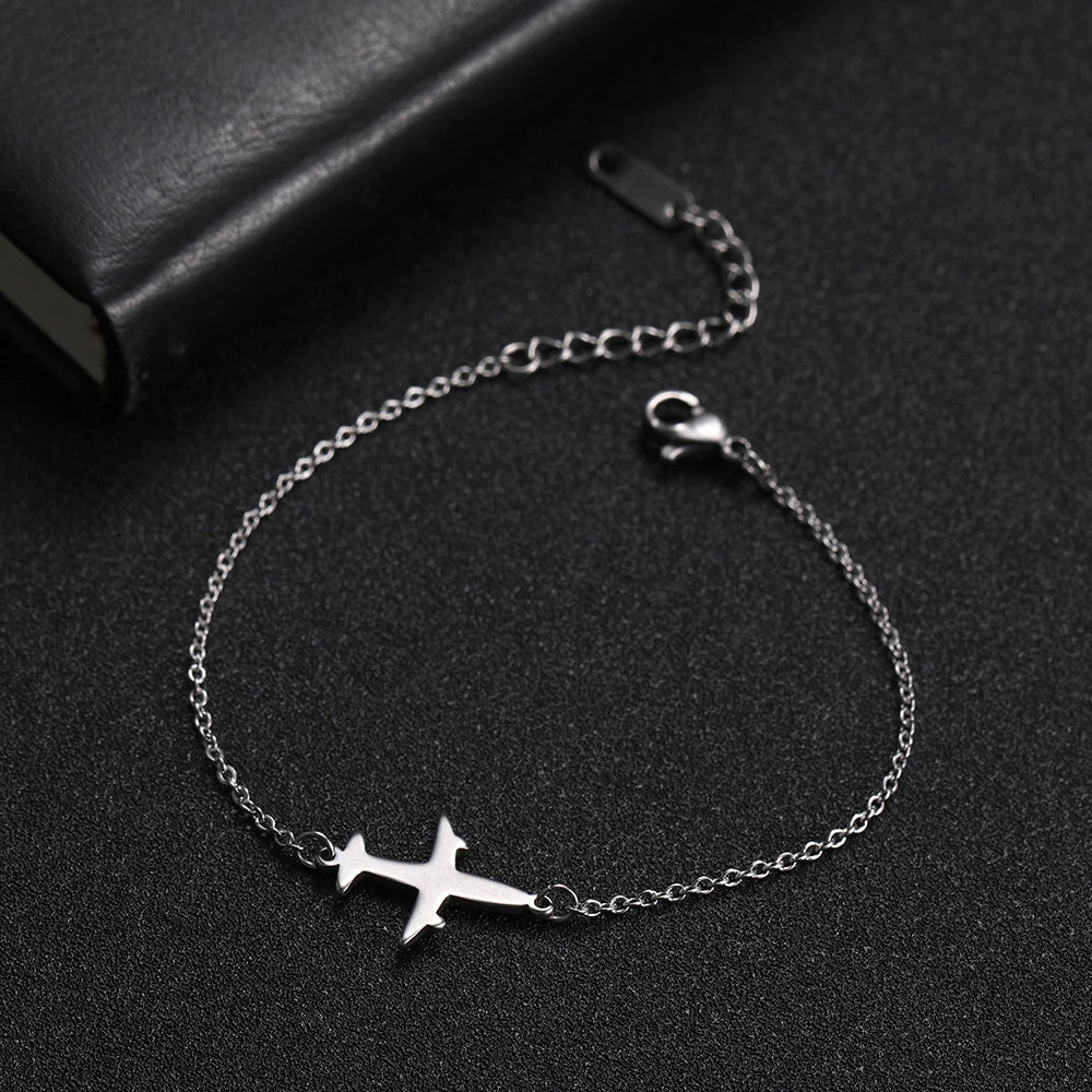 Pulsera con colgante de avión  joyería de mano de acero inoxidable.